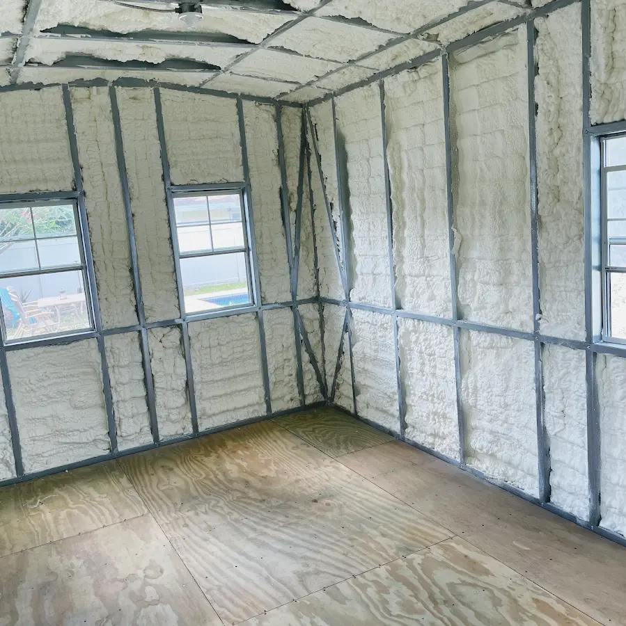 Closed-cell spray foam insulation applied to wall cavities in a residential project in Middletown
